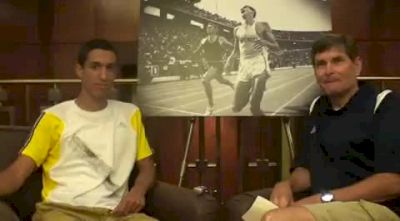 Francis Hernandez talks with Jim Ryun before 2010 Dream Mile