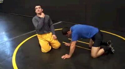 Knee Tap From Front Headlock