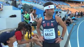 Ryan Fenton talks to coaches after the race