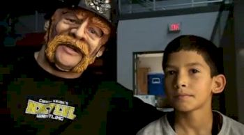 Jordan Aluyan and Coach Magnum