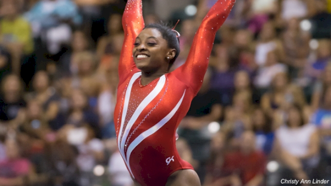 Simone Biles red leo salute smile flash.jpg