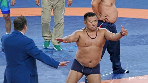 Mongolian Coaches Strip Naked In Protest During Olympics