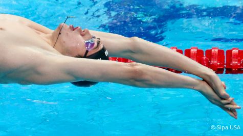 Day 5 Prelims | Kolesnikov Snags 4th WJR With 23.10 In 50m Back