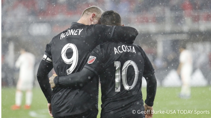 Wayne Rooney and Luciano Acosta