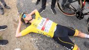 Reaction: Tadej Pogacar Collapses On Summit Of Col du Portet