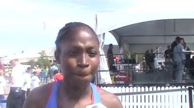 Crystal Emmanuel in between 200-100 double 2012 Donovan Bailey Invitational