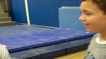 PSU assistant coach, Carlos Vazquez, shares his post-meet thoughts with 9-year-old reporter, Cristian Vazquez