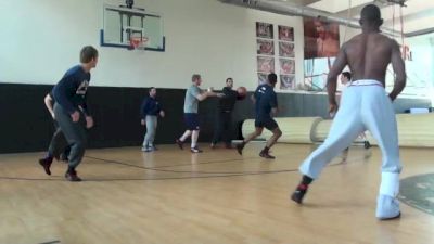 Olympic wrestlers playing basketball