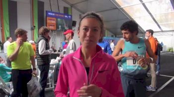 Emily Infeld looking strong on the road and mid-interview coaching session after NYRR Dash 5k 2013