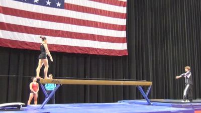 A full twisting double back beam dismount for Victoria Moors