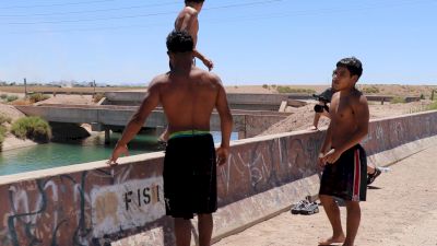 Jumping Off The Tall Bridge Into The Canal